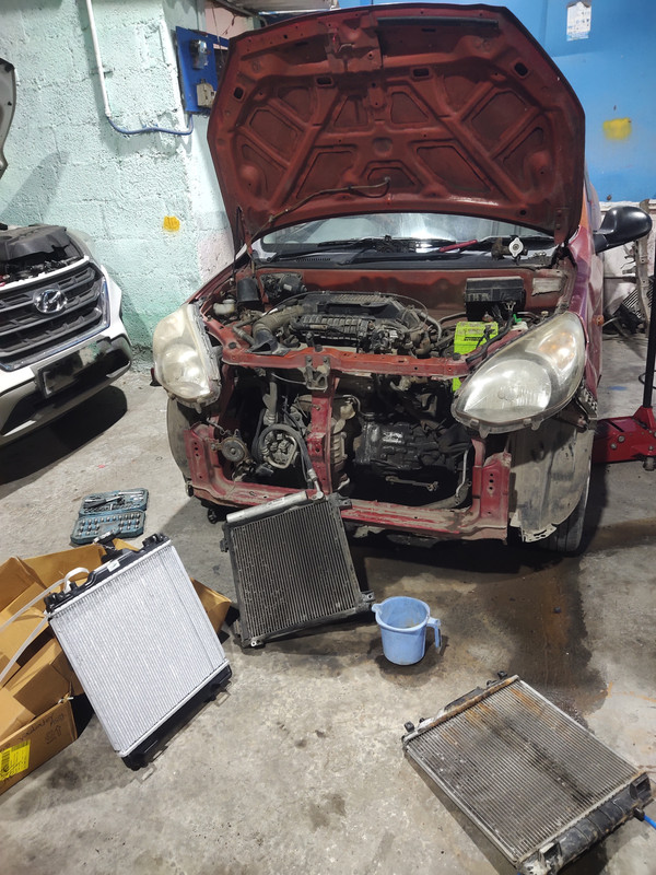 Radiator coolent leakage replacement and a/c gase change