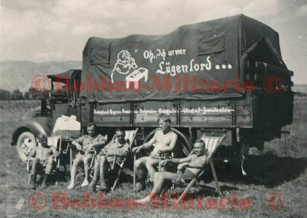 Ford G917T open cab with slogans - left