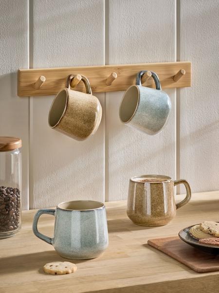 blue and brown stoneware mugs