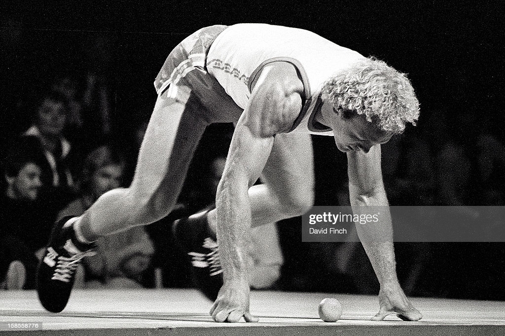 brian-jacks-with-his-famous-orange-in-front-breaks-the-squat-thrusts-picture-id158558776