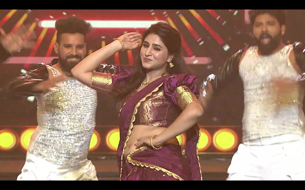 Anchor Varshini dance photos  Varshini latest viral pics  Varshini hot navel dance  Telugu anchor Varshini photoshoot  Varshini stage performance pictures  Varshini glamorous looks