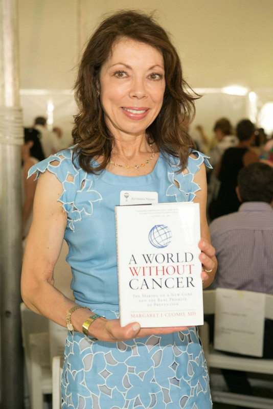 Margaret I. Cuomo with her book A world without cancer at Gardiner Farm 36 James Lane East Hampton, NY.