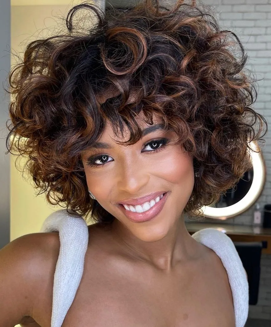 Short curly hairstyle black hair with red highlights