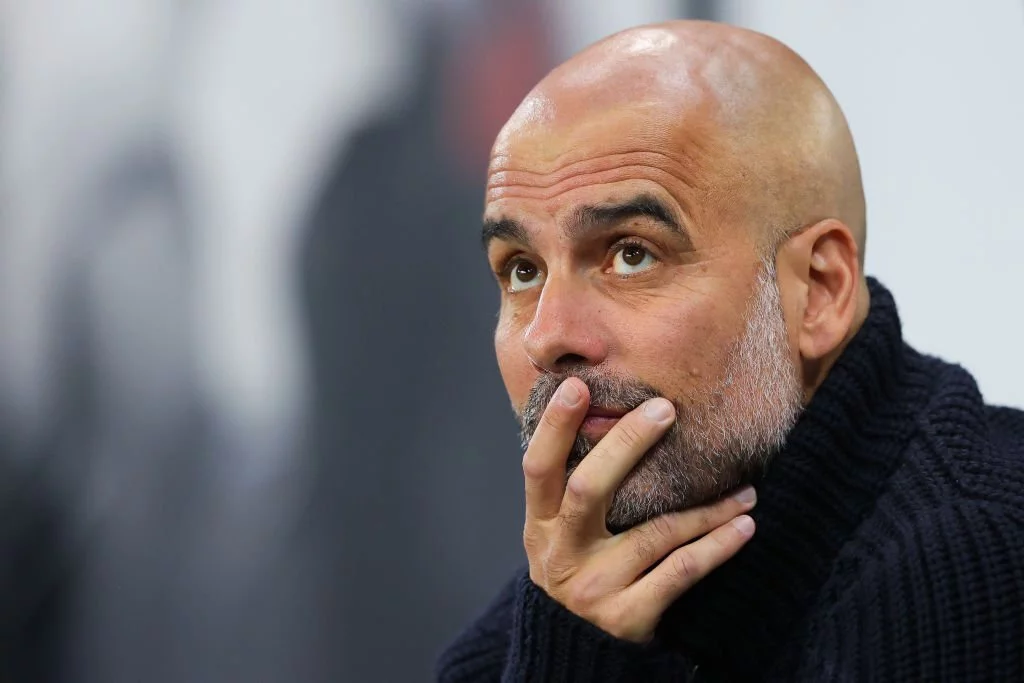 Josep Guardiola managing Manchester City