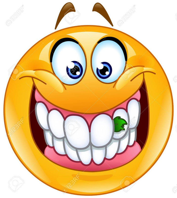 64036760-sourire-émoticône-avec-de-la-nourriture-coincé-entre-ses-dents-quelque-chose-dans-ses-dents