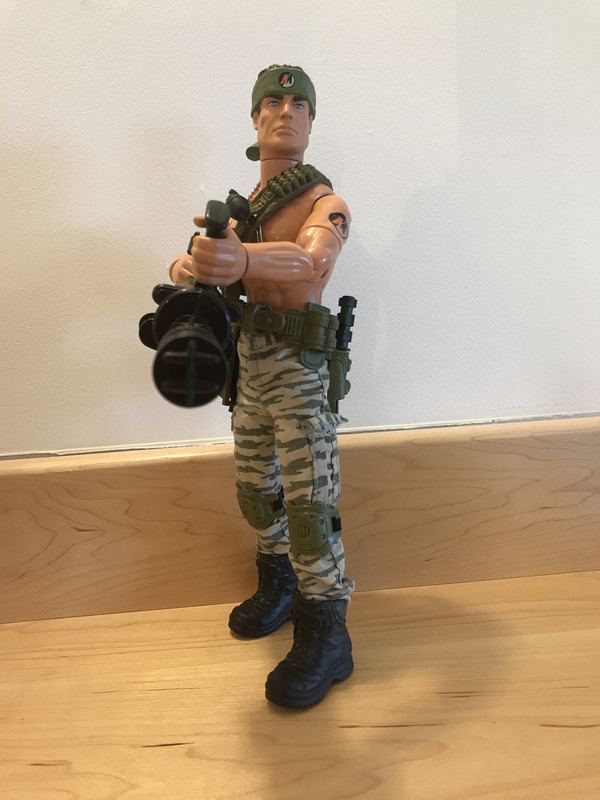 Action Man holding a high speed Gatling gun. 39176-E03-B37-E-43-A3-BC7-D-0-B4-A5-FE057-B2