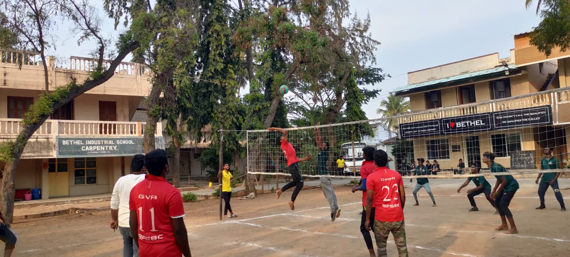 Students playing volleyball