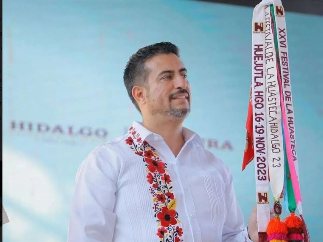Candidato de Morena a diputado federal insulta y reta a golpes a comerciante: VIDEO