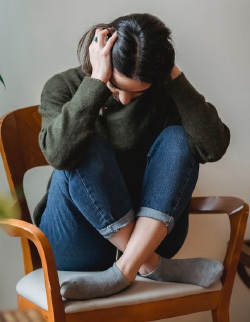 Girl trying to stop negative thoughts