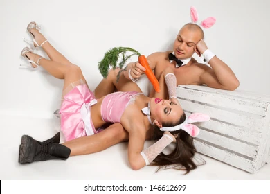 lovely-couple-rabbit-costumes-carrots-260nw-146612699