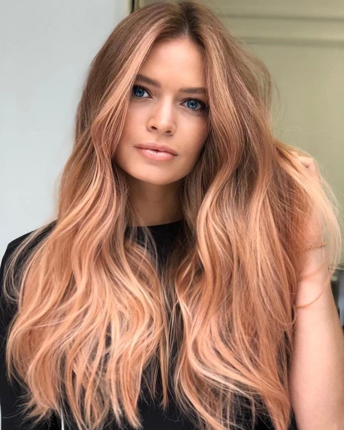 Long strawberry reddish blonde hair