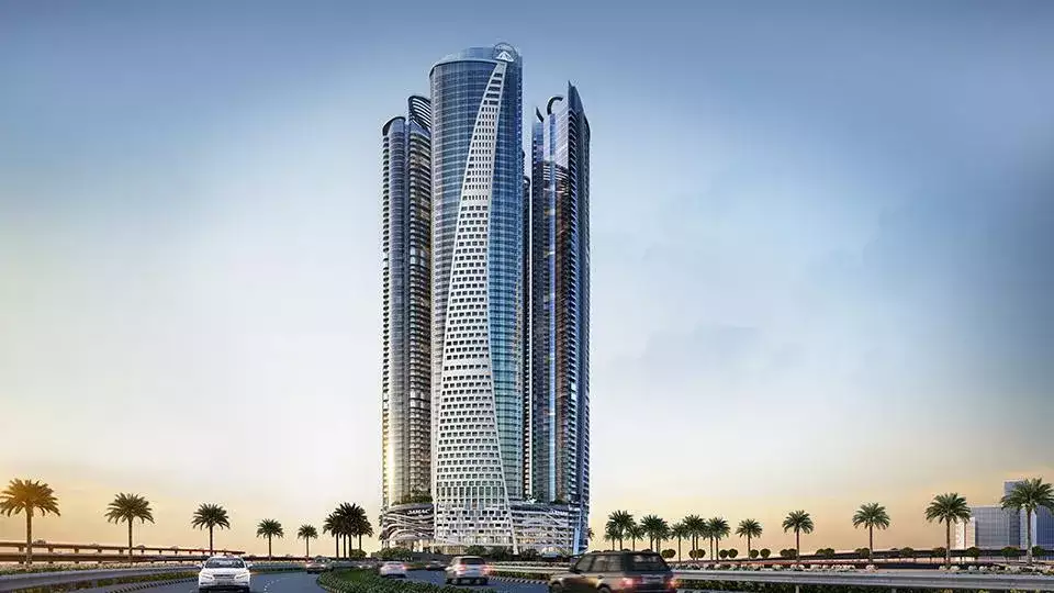 Exterior view of Damac Paramount - Tower D luxury residential tower in Business Bay Dubai with modern glass façade and premium serviced apartments overlooking the canal and skyline, showcasing a high-end investor opportunity Distress Deal in Damac Paramount - Tower D