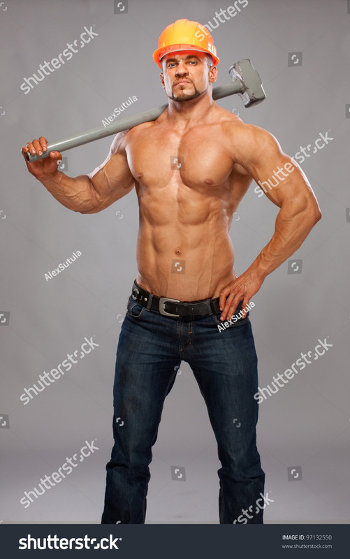stock-photo-young-and-handsome-builder-with-a-sledgehammer-and-s