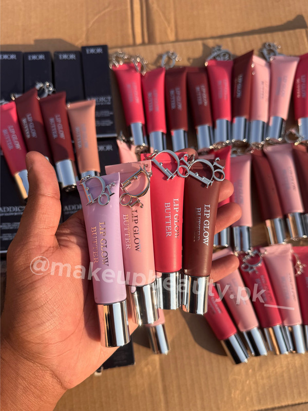 Dior Addict Lip Glow Butter Balm with Dior keychain attached.