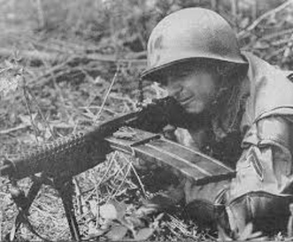 Foto de 1943 de la revista del USMC The Leatherneck que muestra a un paramarine disparando un LMG de 1941 Foto de 1943 de la revista del USMC The Leatherneck que muestra a un paramarine disparando un LMG de 1941