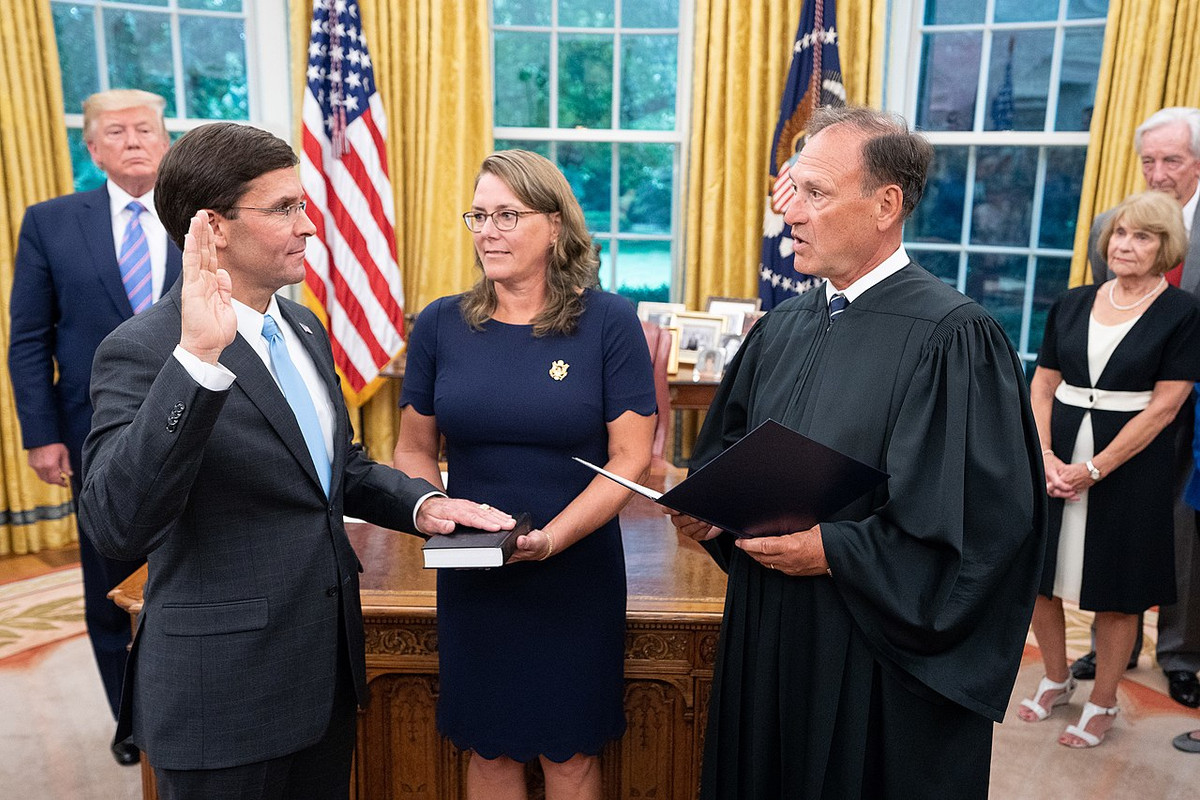 Esper, with his wife Leah, is sworn in as Secretary of Defense by Justice Samuel Alito on July 23, 2019