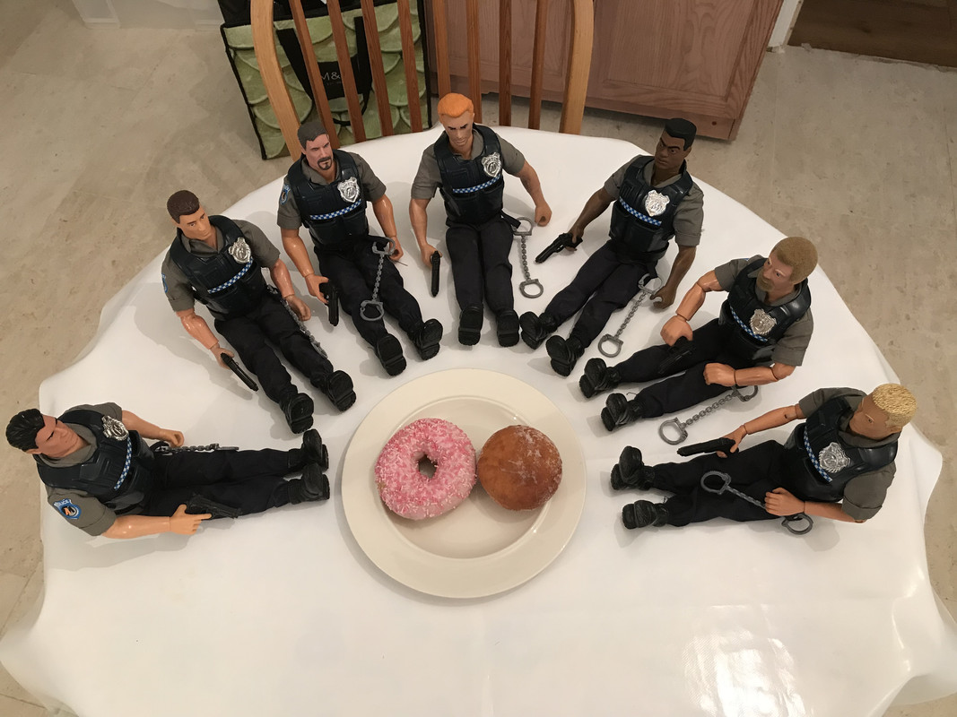 Two donuts between seven policemen. 512-B8-EE8-161-F-4324-B76-A-4-B6311412722