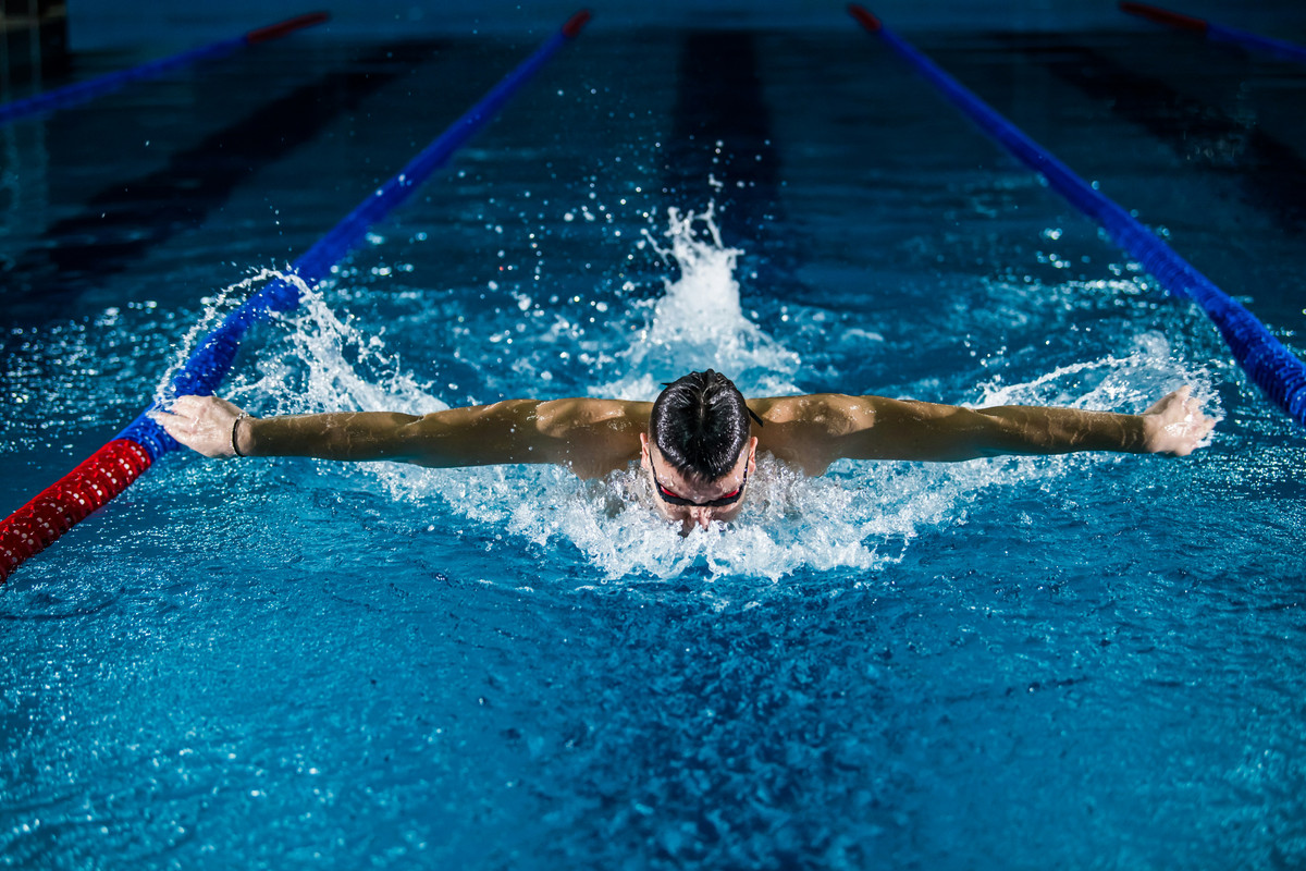 Person swimming laps in a pool