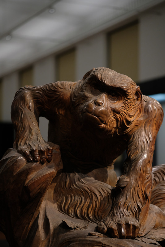 Monkey statue fighting an eagle