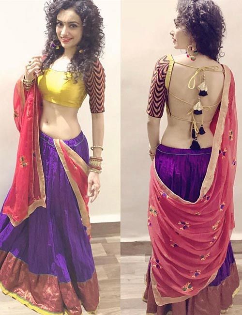 2) Backless blouse with the work done up overall