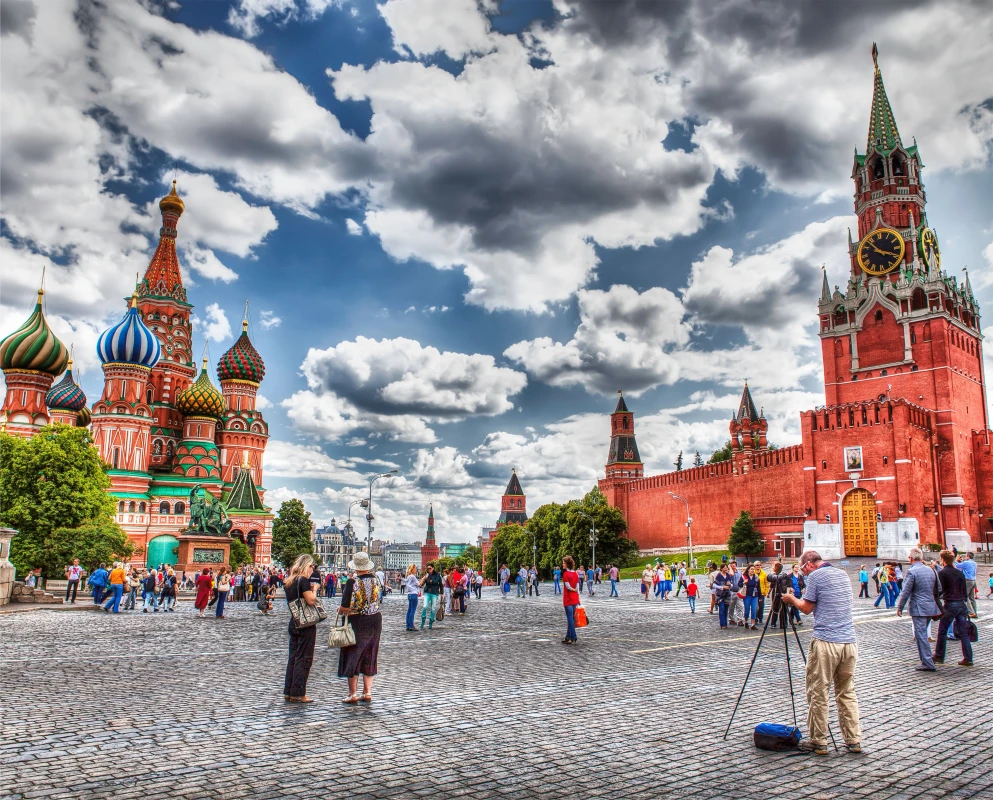 Panoramic view of Red Square in Moscow with Kremlin walls and Spasskaya Tower.