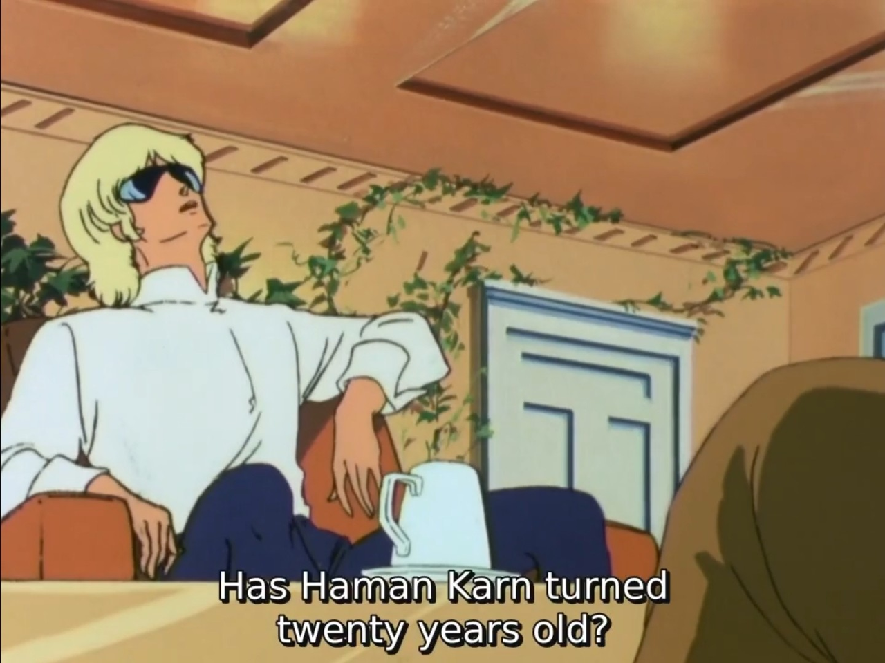 Char leans back in his seat and looks up at the ceiling while saying, "Has Haman Karn turned twenty years old?"