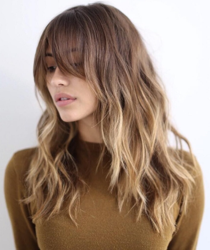 Long blonde wavy octopus haircut