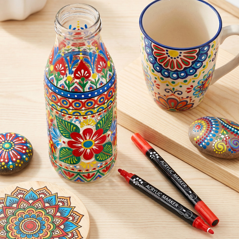 Pietre pictate și sticlă decorată cu markere acrilice