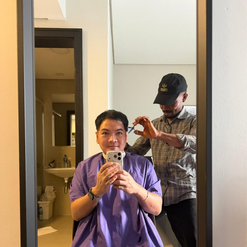 Austin working with an Asian client at the studio