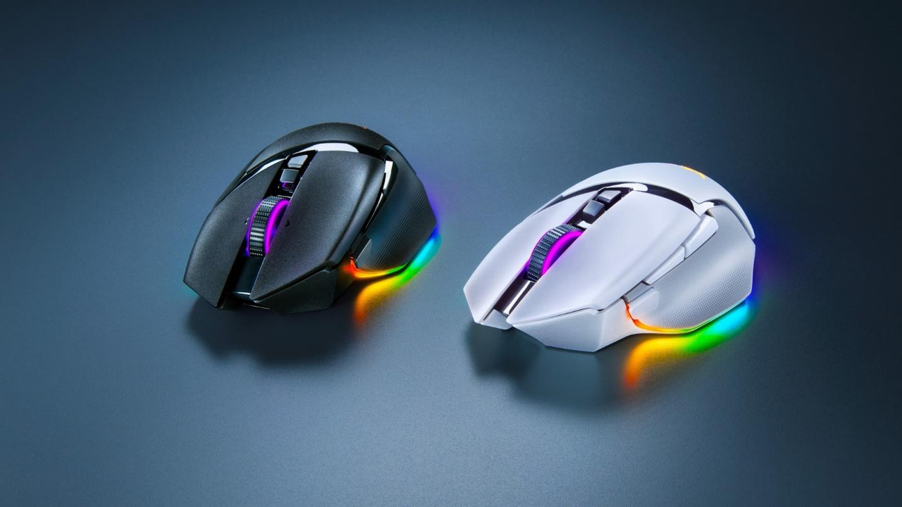 Two computer mouses with rainbow lightsDescription automatically generated Two computer mouses with rainbow lightsDescription automatically generated