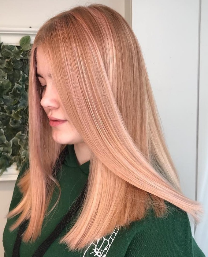 Long tick golden melon colored hair