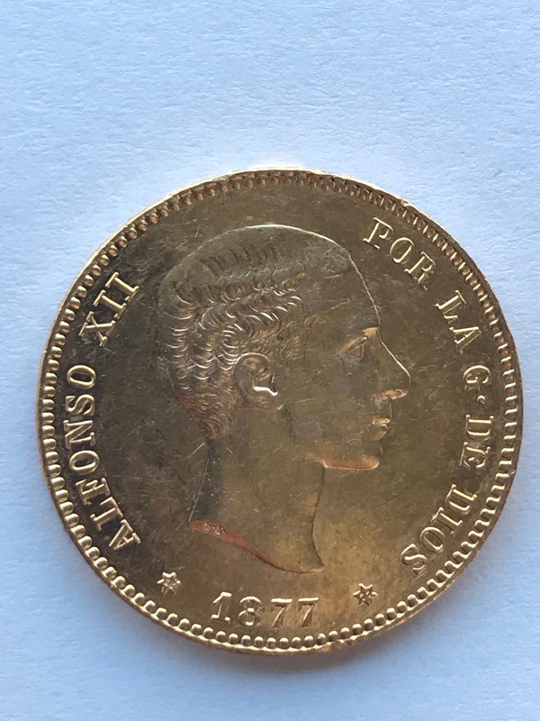 25 pesetas 1877. Alfonso XII. Opinión E0cd21b4-bcf1-4b21-84ed-181a234dcdc2