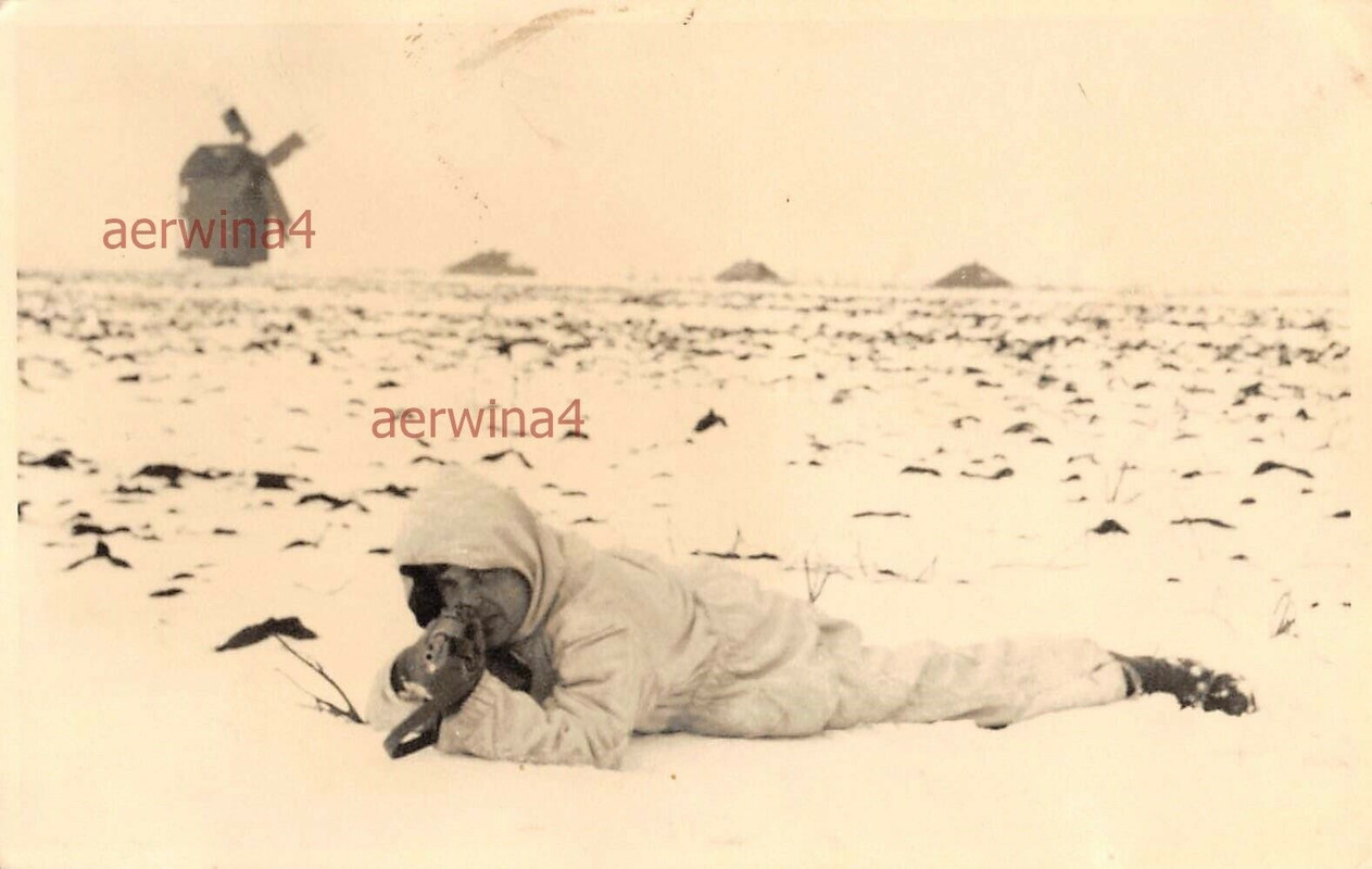 Soldat Wintertarn an Windmühle Kosinka Dnipropetrowsk Ukraine Ostfront