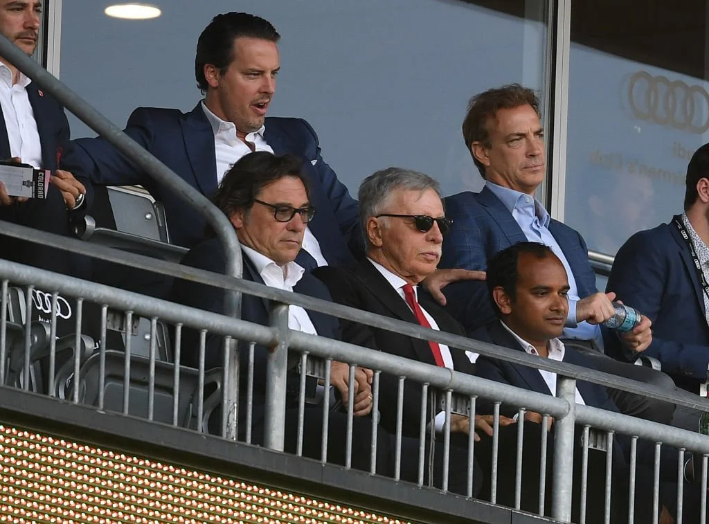 Stan Kroenke and Vinai Vankatesham watching Arsenal