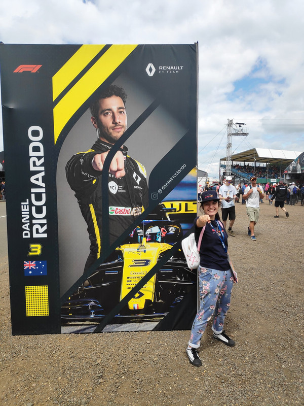 Hayley making the pose in the Daniel Ricciardo poster