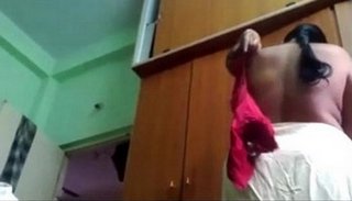 Desi Mature Telugu Aunty is changing her bra