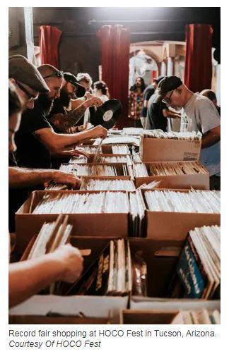 Record fair shopping at HOCO Fest in Tucson, Arizona.