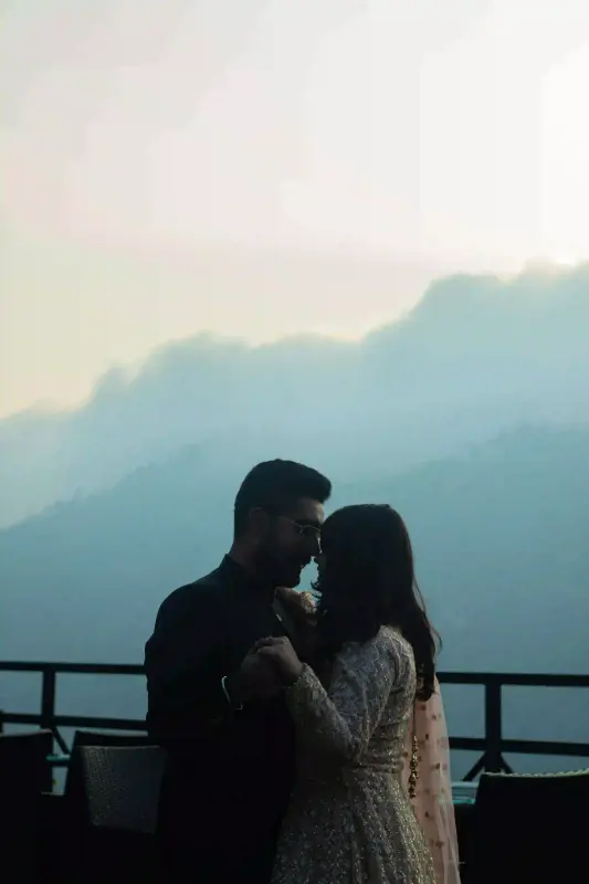 Couple enjoying hotel balcony in Manali by ThrillMyTravel