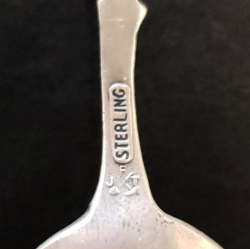 JFT in a crossed Pickaxe and Shovel  2