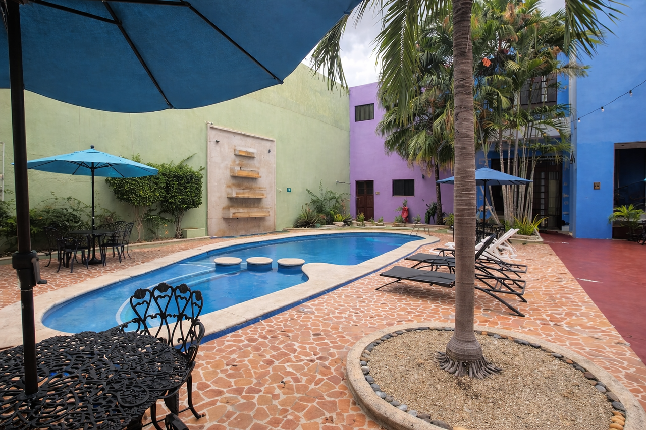 Pool and social areas at Hotel Centro Historico Merida