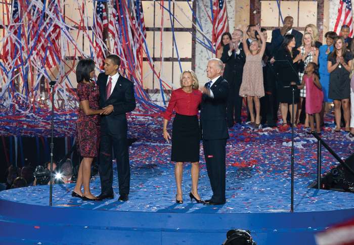 Michelle and Barack Obama (couple at left) and Jill and Joe Biden at Invesco Field on the final night of the Democratic National Convention in Denver, 2008