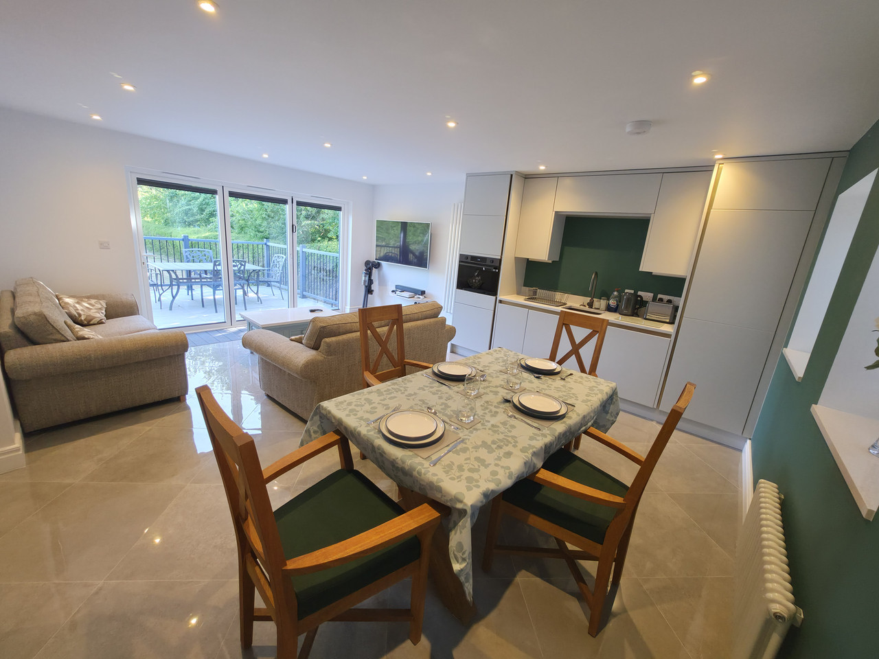 Kitchen with microwave oven grill combo and portable hob