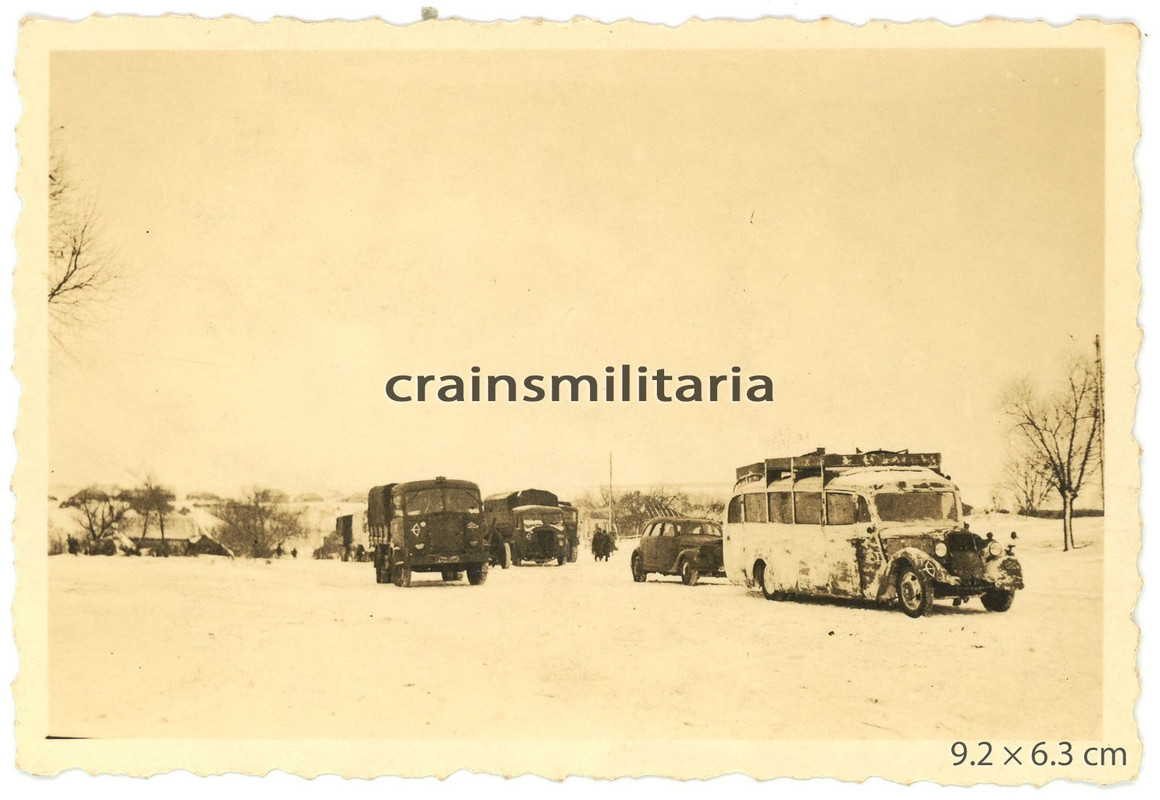 Orig. Foto Beute Lkw und Omnibus mit 197.ID Wappen im Winter b. OREL Russland