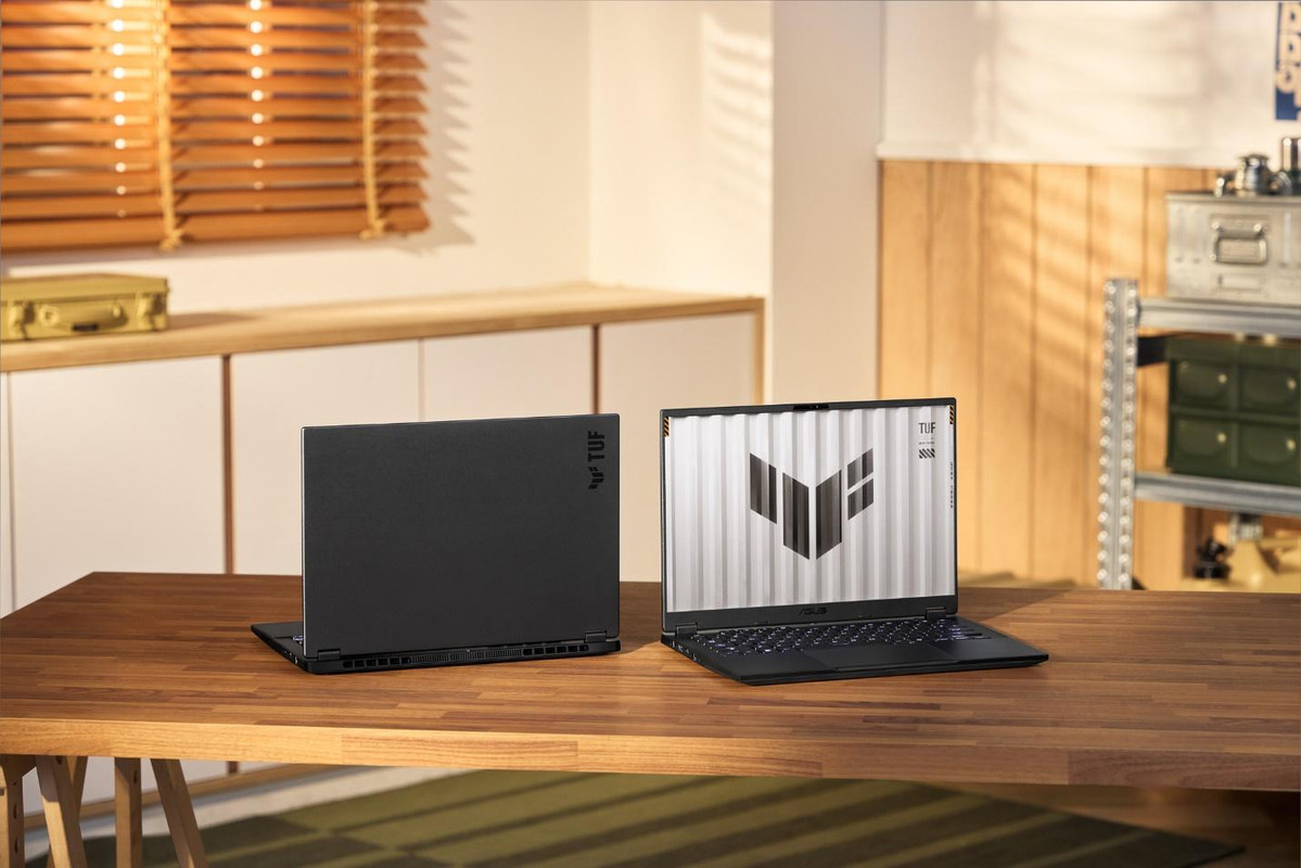 A couple of laptops on a tableDescription automatically generated A couple of laptops on a tableDescription automatically generated