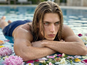 Man-lying-in-swimming-pool-202605112235