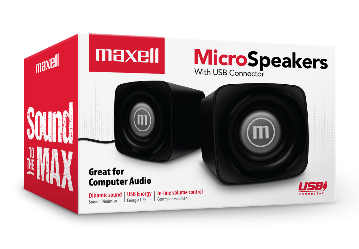Una persona utilizando las bocinas Maxell junto a su laptop.