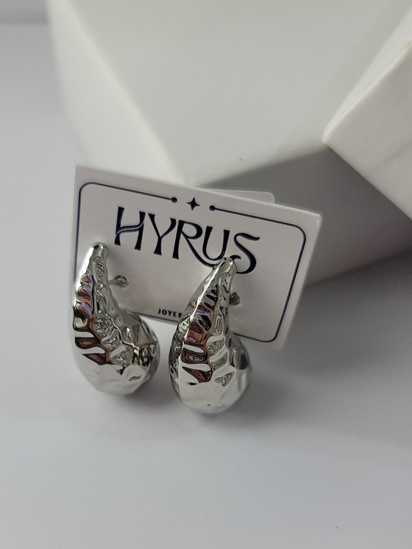 Arete plateado 13