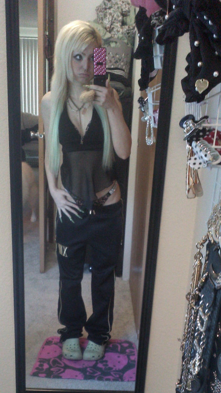 mirror selfie of Ray in a sheer outfit with lingerie underneath
