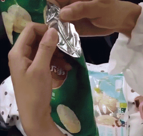 Mini bag sealer shown next to sealed food packets