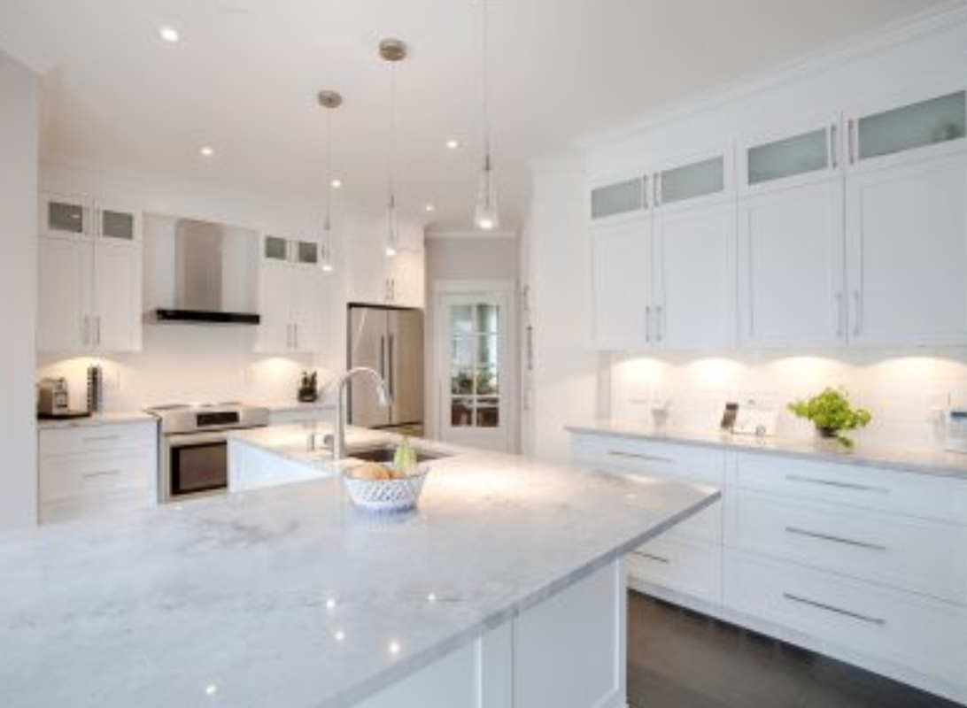 Modern open concept kitchen with island and pendant lighting